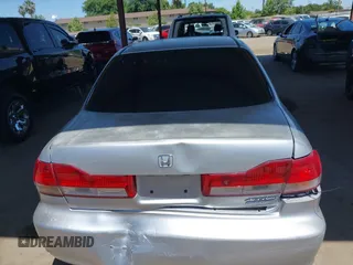 2002 Honda Accord SE z VIN JHMCG66892C011913, wystawiony jako IAAI lot #42323509 z przebiegiem 226 288 mil mil oraz . Historia ofert i sprzedaży dostępna na DreamBid. Obrazek 16.
