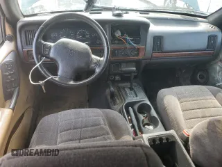 1997 Jeep Grand Cherokee Laredo with VIN 1J4GZ58SXVC595012, listed as a Copart auction lot 59746655 with Not provided miles and Salvage title. Bid and sale history available at DreamBid. Image 8.
