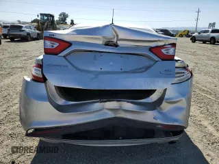 2015 Ford Fusion SE with VIN 3FA6P0HD8FR137683, listed as a Copart auction lot 57684495 with 115,282 mi miles and Salvage title. Bid and sale history available at DreamBid. Image 6.