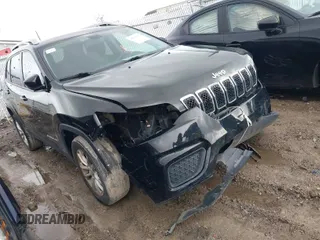 2020 Jeep Cherokee Latitude with VIN 1C4PJLCBXLD619261, listed as a IAAI auction lot 40831552 with 80,423 mi miles. Bid and sale history available at carsss.com. Image 1.