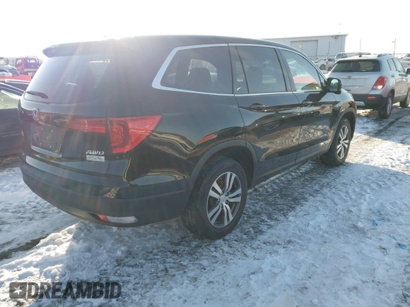 2016 Honda Pilot EX-L with VIN 5FNYF6H7XGB115951, listed as a IAAI auction lot 41642756 with 101,688 mi miles. Bid and sale history available at carsss.com. Image 4.