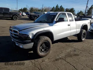 2004 Dodge Dakota Sport with VIN 1D7HG32N54S749241, listed as a Copart auction lot 86437084 with 94,879 mi miles and Salvage Title. Bid and sale history available at carsss.com. Image 1.