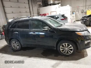 2012 Kia Sorento SX with VIN 5XYKW4A2XCG209369, listed as a IAAI auction lot 41693091 with 195,249 mi miles. Bid and sale history available at carsss.com. Image 13.