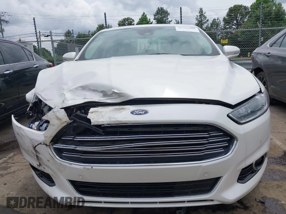 2016 Ford Fusion Titanium Hybrid with VIN 3FA6P0RU3GR190355, listed as a IAAI auction lot 42384309 with 157,172 mi miles and . Bid and sale history available at DreamBid. Image 12.