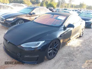 2021 Tesla Model S Plaid with VIN 5YJSA1E62MF451785, listed as a IAAI auction lot 40520806 with 31,084 mi miles. Bid and sale history available at carsss.com. Image 19.