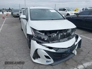 2022 Toyota Prius LE z VIN JTDKAMFP9N3197449, wystawiony jako IAAI lot #41896527 z przebiegiem 34 660 mil mil oraz . Historia ofert i sprzedaży dostępna na DreamBid. Obrazek 1.