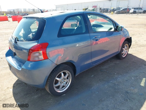 2008 Toyota Yaris with VIN JTDJT923085211222, listed as a IAAI auction lot 41866077 with 198,933 mi miles. Bid and sale history available at carsss.com. Image 4.
