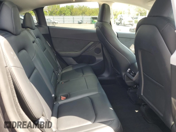 2025 Tesla Model Y Long Range with VIN 7SAYGDED8SF241779, listed as a Copart auction lot 51899205 with 12,409 mi miles and Salvage Title. Bid and sale history available at DreamBid. Image 11.