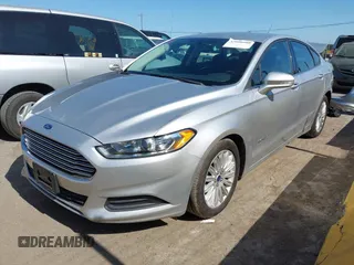 2015 Ford Fusion SE Hybrid with VIN 3FA6P0LUXFR296373, listed as a IAAI auction lot 42600980 with 76,985 mi miles and . Bid and sale history available at DreamBid. Image 2.