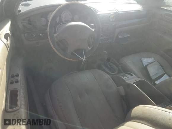 2004 Chrysler Sebring LXi z VIN 1C3EL55R74N121400, wystawiony jako Copart lot #80369614 z przebiegiem Nie podano mil oraz Nie do naprawy • Non repairable. Historia ofert i sprzedaży dostępna na DreamBid. Obrazek 8.