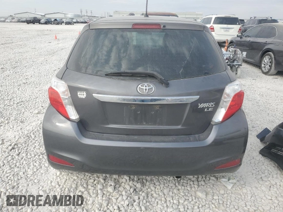 2013 Toyota Yaris L z VIN JTDJTUD33DD571231, wystawiony jako Copart lot #75826024 z przebiegiem 224 036 mil mil oraz Szkoda całkowita • Salvage title. Historia ofert i sprzedaży dostępna na DreamBid. Obrazek 6.