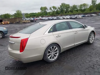 2016 Cadillac XTS Luxury Collection with VIN 2G61N5S39G9142876, listed as a IAAI auction lot 42337302 with 156,510 mi miles and . Bid and sale history available at DreamBid. Image 4.
