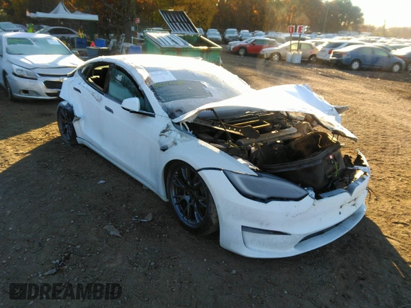 2022 Tesla Model S with VIN 5YJSA1E54NF488023, listed as a IAAI auction lot 36074023 with 200 mi miles and . Bid and sale history available at DreamBid. Image 1.