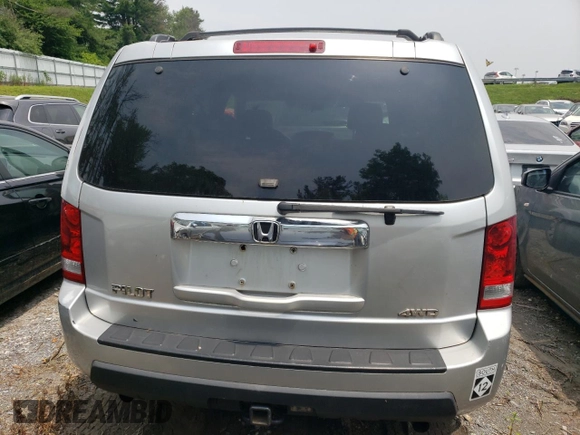 2009 Honda Pilot LX with VIN 5FNYF48259B040040, listed as a Copart auction lot 59860445 with 213,459 mi miles and Salvage title. Bid and sale history available at DreamBid. Image 6.