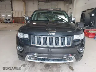 2014 Jeep Grand Cherokee Overland with VIN 1C4RJFCM4EC386398, listed as a IAAI auction lot 41696113 with 119,110 mi miles. Bid and sale history available at carsss.com. Image 12.