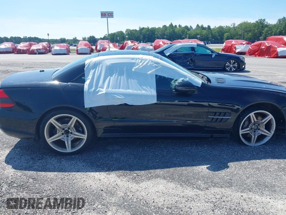 2011 Mercedes-Benz SL 550 with VIN WDBSK7BA0BF161710, listed as a IAAI auction lot 41687889 with 60,719 mi miles and . Bid and sale history available at DreamBid. Image 13.