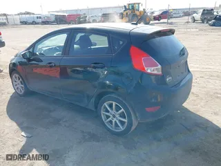 2016 Ford Fiesta SE with VIN 3FADP4EJ3GM170260, listed as a IAAI auction lot 41769063 with 137,970 mi miles. Bid and sale history available at carsss.com. Image 3.