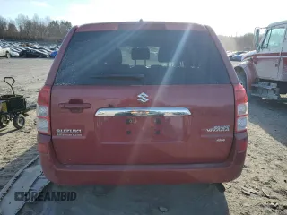 2012 Suzuki Grand Vitara Premium z VIN JS3TD0D65C4100898, wystawiony jako Copart lot #87241744 z przebiegiem Nie podano mil oraz Szkoda całkowita • Salvage title. Historia ofert i sprzedaży dostępna na DreamBid. Obrazek 6.