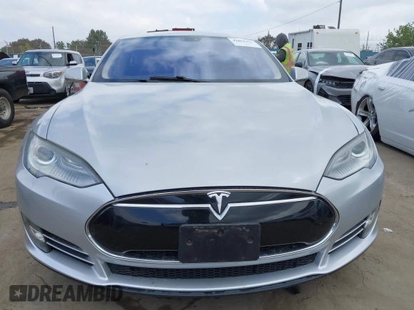2013 Tesla Model S with VIN 5YJSA1DG7DFP11382, listed as a IAAI auction lot 42056169 with 126,975 mi miles. Bid and sale history available at carsss.com. Image 12.