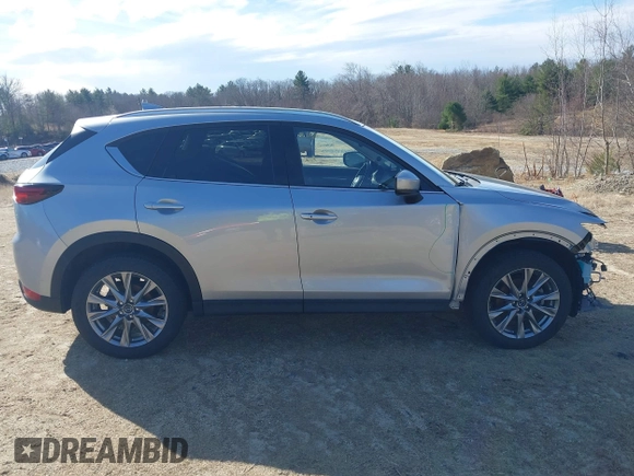 2021 Mazda CX-5 Grand Touring Reserve with VIN JM3KFBAY5M0472988, listed as a IAAI auction lot 41897855 with 27,318 mi miles. Bid and sale history available at carsss.com. Image 14.