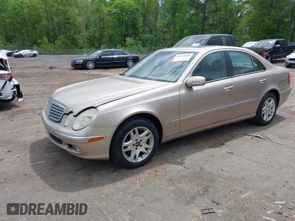 2003 Mercedes-Benz E-Class 3.2L with VIN WDBUF65J23A243178, listed as a IAAI auction lot 41974660 with 134,459 mi miles. Bid and sale history available at carsss.com. Image 2.