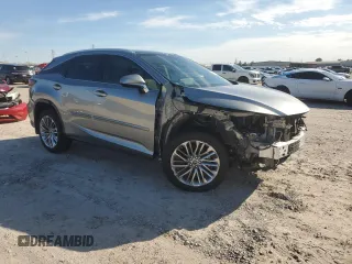 2022 Lexus RX with VIN 2T2JZMAA8NC256470, listed as a Copart auction lot 82873304 with 14,614 mi miles and Salvage Title. Bid and sale history available at carsss.com. Image 4.