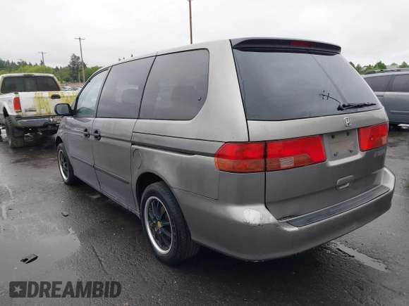 2000 Honda Odyssey LX z VIN 2HKRL1857YH570211, wystawiony jako IAAI lot #42139263 z przebiegiem 161 983 mil mil oraz . Historia ofert i sprzedaży dostępna na DreamBid. Obrazek 3.