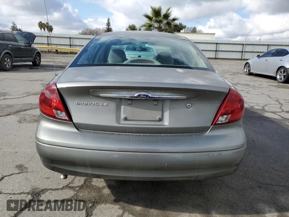 2001 Ford Taurus LX with VIN 1FAFP52U01A131563, listed as a Copart auction lot 89201965 with 79,048 mi miles and Salvage title. Bid and sale history available at DreamBid. Image 6.