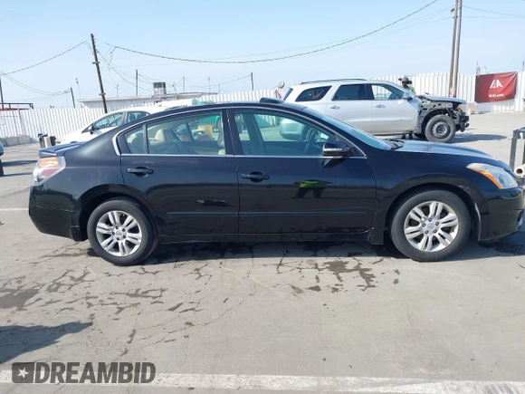 2012 Nissan Altima 2.5 S with VIN 1N4AL2AP4CN533534, listed as a IAAI auction lot 41890287 with 97,097 mi miles. Bid and sale history available at carsss.com. Image 14.