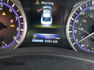 2015 Infiniti Q50 Premium with VIN JN1BV7AR8FM417774, listed as a IAAI auction lot 41909847 with 39,377 mi miles. Bid and sale history available at carsss.com. Image 7.