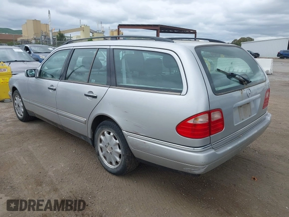 1999 Mercedes-Benz E-Class with VIN WDBJH65F5XA721205, listed as a IAAI auction lot 42068204 with 183,421 mi miles. Bid and sale history available at carsss.com. Image 3.