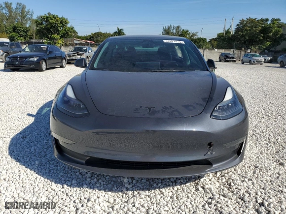2023 Tesla Model 3 with VIN 5YJ3E1EA3PF427867, listed as a Copart auction lot 41621475 with 43,510 mi miles and Non Repairable. Bid and sale history available at carsss.com. Image 5.