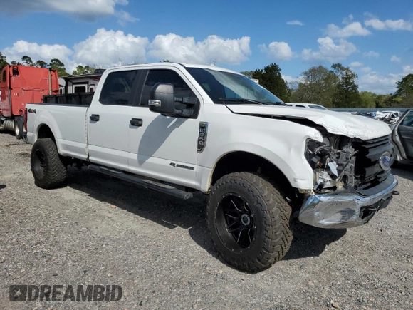 2017 Ford Super Duty F-250 SRW Lariat with VIN 1FT7W2BT2HEE85689, listed as a Copart auction lot 51426635 with 210,236 mi miles and Salvage Title. Bid and sale history available at carsss.com. Image 4.