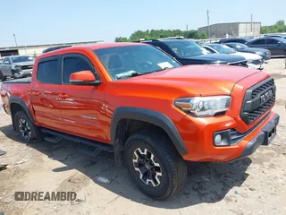2017 Toyota Tacoma SR5 with VIN 5TFCZ5AN4HX091383, listed as a IAAI auction lot 42202505 with 82,000 mi miles and . Bid and sale history available at DreamBid. Image 1.