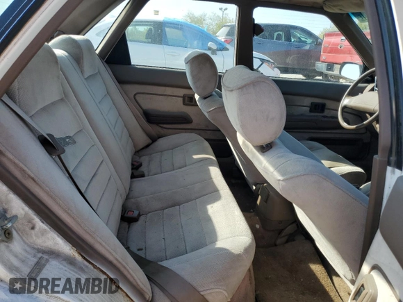 1990 Geo Prizm z VIN 1Y1SK5464LZ109720, wystawiony jako Copart lot #75422054 z przebiegiem 251 459 mil mil oraz Szkoda całkowita • Salvage title. Historia ofert i sprzedaży dostępna na DreamBid. Obrazek 10.