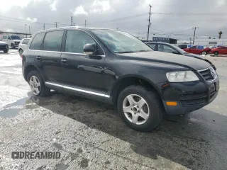 2005 Volkswagen Touareg z VIN WVGZG77LX5D063808, wystawiony jako Copart lot #44457935 z przebiegiem 172 252 mil mil oraz Czysty tytuł • Clean title. Historia ofert i sprzedaży dostępna na DreamBid. Obrazek 4.