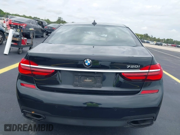2018 BMW 7 Series 750i z VIN WBA7F0C54JGM23528, wystawiony jako IAAI lot #42205896 z przebiegiem 91 772 mil mil oraz . Historia ofert i sprzedaży dostępna na DreamBid. Obrazek 16.