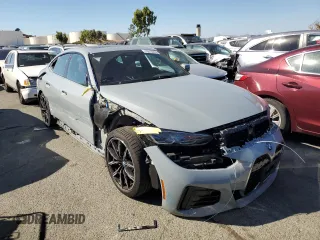 2022 BMW i4 eDrive40 z VIN WBY73AW0XNFN24679, wystawiony jako Copart lot #70213313 z przebiegiem 14 403 mil mil oraz . Historia ofert i sprzedaży dostępna na DreamBid. Obrazek 4.