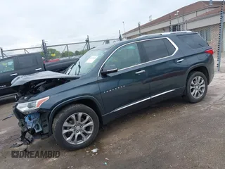 2018 Chevrolet Traverse Premier z VIN 1GNEVJKW4JJ240024, wystawiony jako IAAI lot #42369659 z przebiegiem 160 147 mil mil oraz . Historia ofert i sprzedaży dostępna na DreamBid. Obrazek 2.