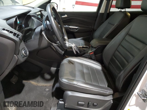 2016 Ford Escape Titanium with VIN 1FMCU9J93GUB78230, listed as a Copart auction lot 51661025 with 98,515 mi miles and Salvage Title. Bid and sale history available at DreamBid. Image 7.