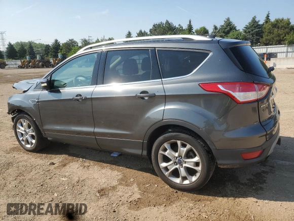2016 Ford Escape Titanium with VIN 1FMCU9J98GUB32375, listed as a Copart auction lot 59564885 with 123,548 mi miles and Salvage title. Bid and sale history available at DreamBid. Image 2.