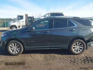 2018 Chevrolet Equinox LT z VIN 2GNAXSEV2J6122861, wystawiony jako IAAI lot #41741471 z przebiegiem 121 123 mil mil oraz . Historia ofert i sprzedaży dostępna na DreamBid. Obrazek 14.