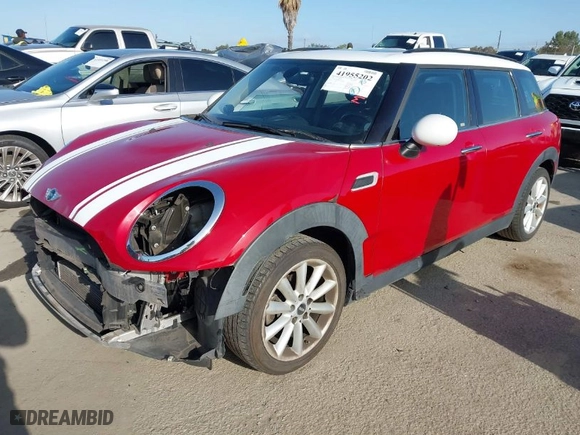 2016 MINI Cooper Clubman with VIN WMWLN5C58G2E30425, listed as a IAAI auction lot 41955202 with 100,798 mi miles. Bid and sale history available at carsss.com. Image 2.