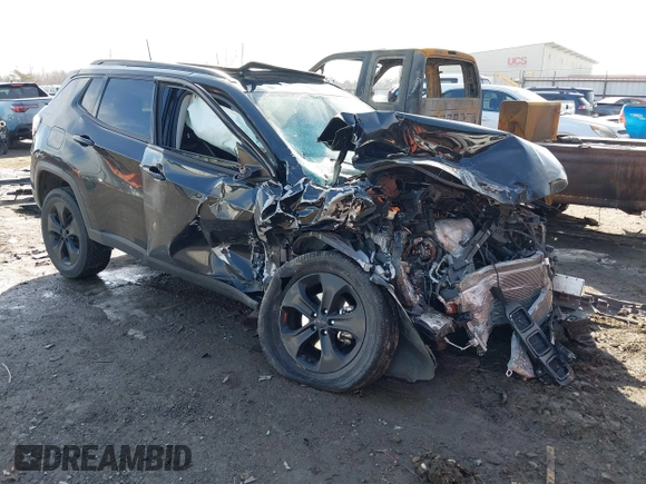 2019 Jeep Compass Latitude with VIN 3C4NJDBB1KT648185, listed as a IAAI auction lot 41622077 with 74,072 mi miles and . Bid and sale history available at DreamBid. Image 1.