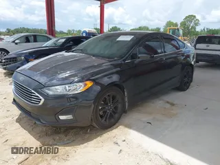 2020 Ford Fusion SE with VIN 3FA6P0HD8LR197796, listed as a IAAI auction lot 42474009 with 74,673 mi miles and . Bid and sale history available at DreamBid. Image 18.