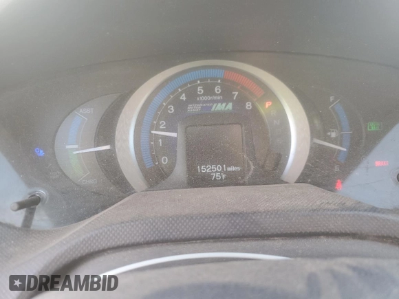2010 Honda Insight EX with VIN JHMZE2H77AS025567, listed as a Copart auction lot 58499135 with 152,501 mi miles and Salvage title. Bid and sale history available at DreamBid. Image 9.