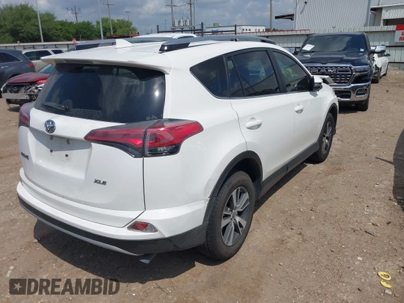 2017 Toyota RAV4 XLE with VIN JTMWFREV8HJ118885, listed as a IAAI auction lot 42097180 with 122,481 mi miles. Bid and sale history available at carsss.com. Image 4.