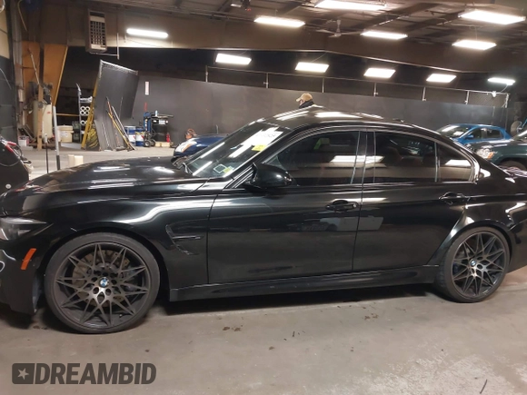 2018 BMW M3 with VIN WBS8M9C5XJ5L71599, listed as a IAAI auction lot 41932825 with 53,730 mi miles. Bid and sale history available at carsss.com. Image 14.