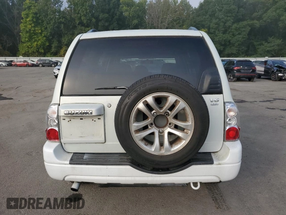 2005 Suzuki XL7 LX z VIN JS3TX92V054105368, wystawiony jako Copart lot #71299494 z przebiegiem 165 498 mil mil oraz Czysty tytuł • Clean title. Historia ofert i sprzedaży dostępna na DreamBid. Obrazek 6.