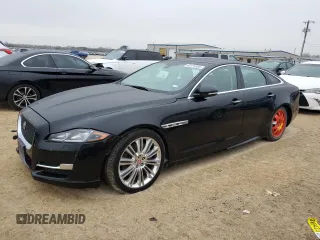 2017 Jaguar XJ with VIN SAJWA1C77H8W04956, listed as a Copart auction lot 45174505 with 142,002 mi miles and Salvage Title. Bid and sale history available at carsss.com. Image 1.